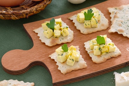 Olive puffs with frittata cubes