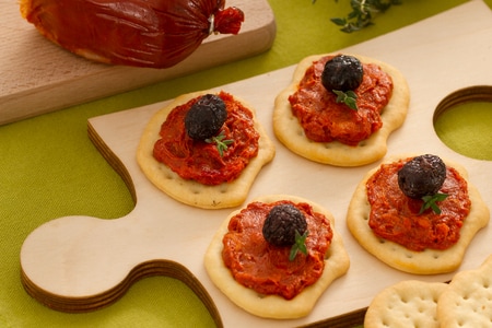 Flatbreads with 'nduja and baked black olives
