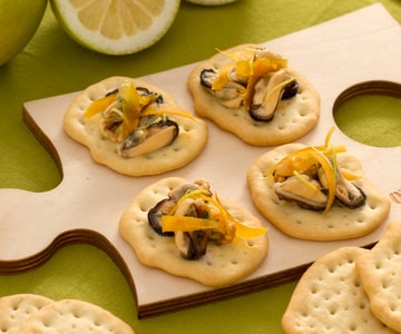 Flatbreads with mussels, bottarga, and lemon zest