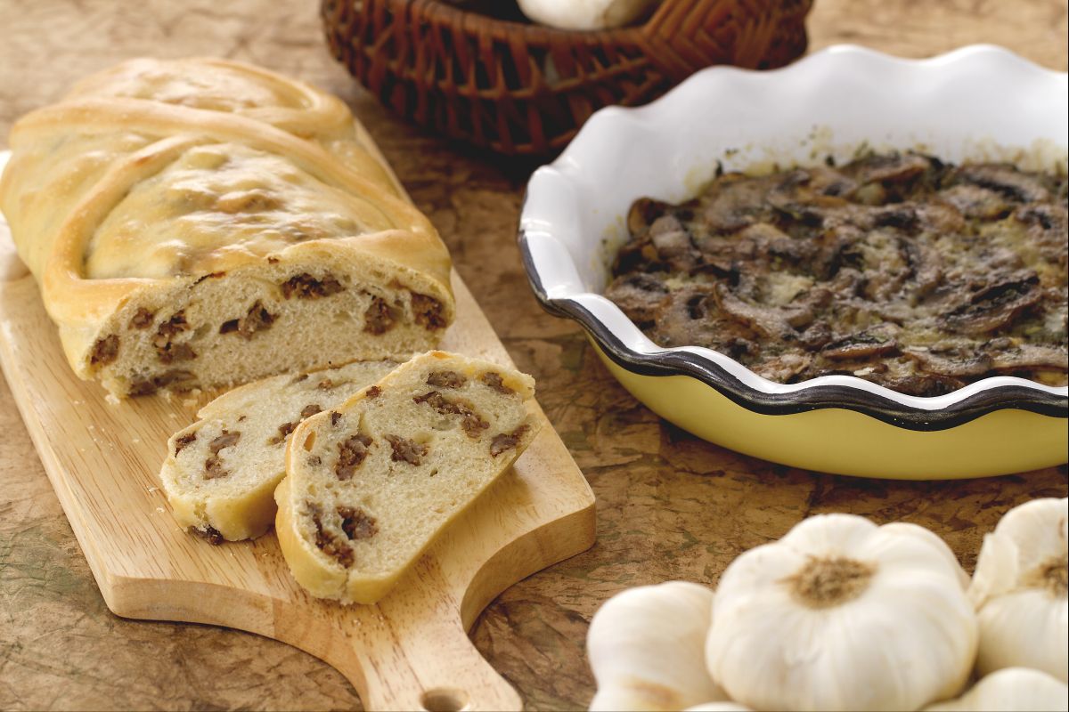 Bread strudel stuffed with sausage and flavorful mushroom pan