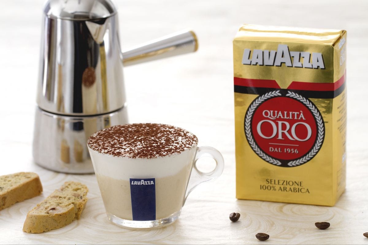 Coffee mousse in cup with cantucci