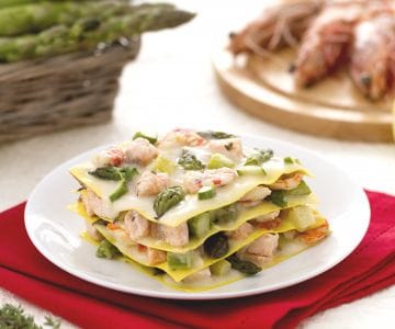 Lasagna with salmon, prawns, and asparagus
