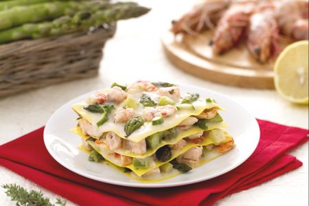 Lasagna with salmon, prawns, and asparagus