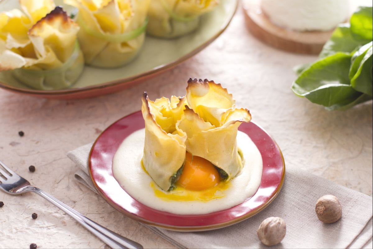 Fresh pasta bundle with molten yolk