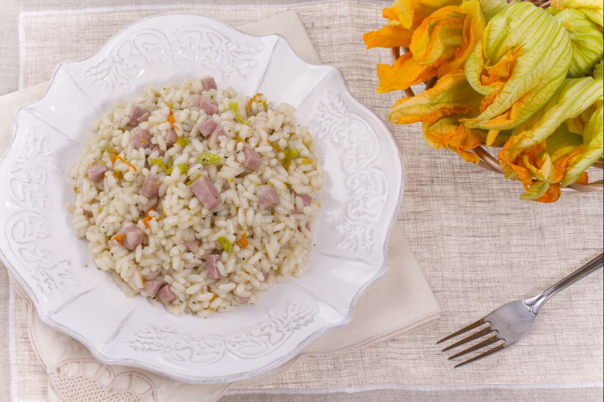 Beer risotto with mortadella and zucchini flowers