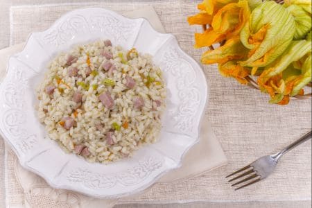 Beer risotto with mortadella and zucchini flowers