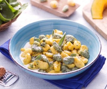 Colored gnocchi with yogurt sauce