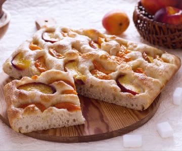 Sweet focaccia with peaches and apricots