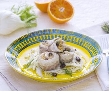 Sea bass fillet with orange on fennel salad