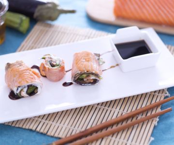 Salmon rolls stuffed with vegetables and cheese