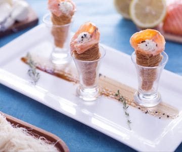 Mini savory croissants with salmon and stracchino