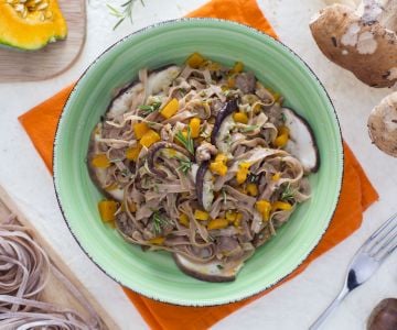Chestnut flour spaghetti alla chitarra with mushrooms, pumpkin, and sausage