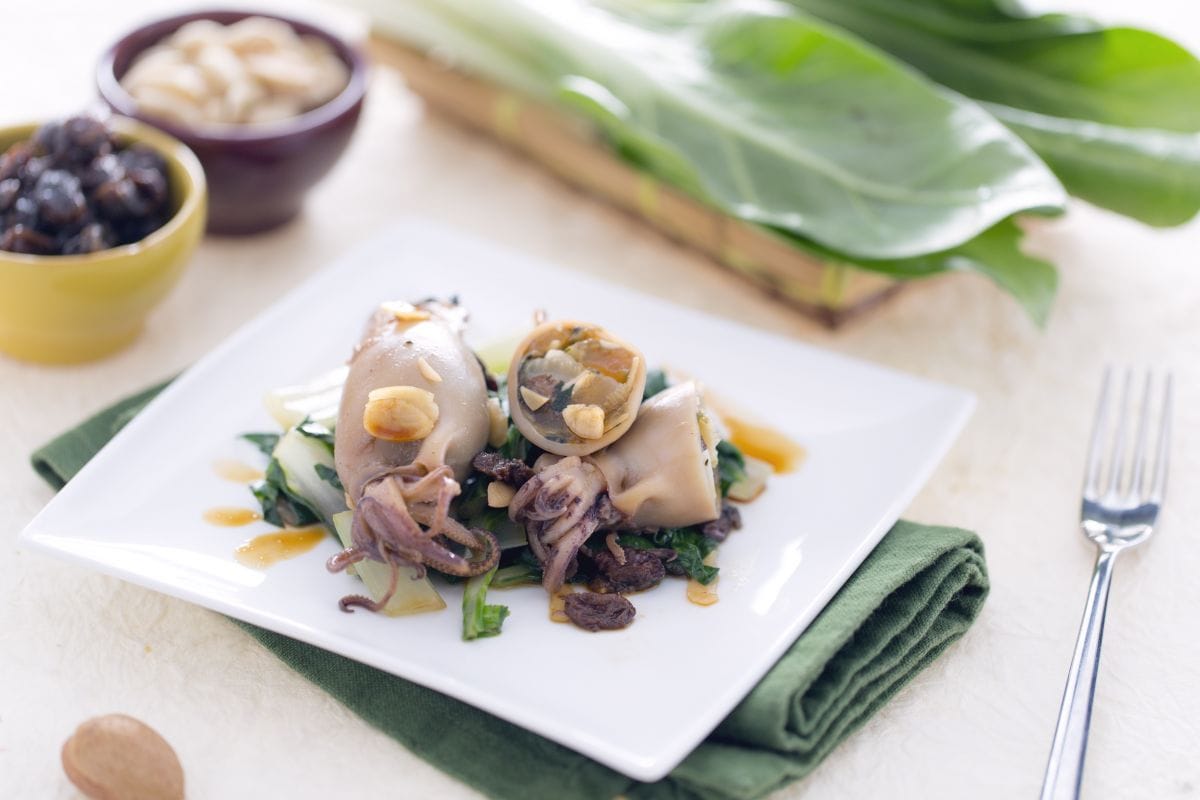 Stuffed Squid with Swiss Chard, Raisins, and Almonds