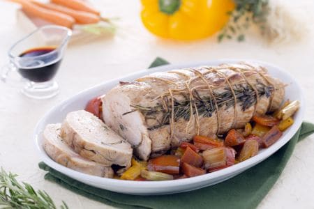 Turkey roast with soy sauce reduction and sautéed vegetables