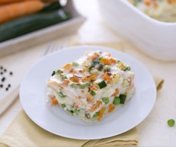 Lasagna with sliced bread, cheese, and vegetable ragù