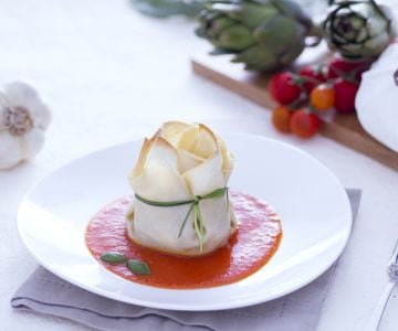 Pouches with burrata, artichokes, and tomato sauce