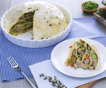 Lasagna dome with vegetables, fontina, and ham