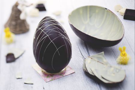 Two-flavor Easter egg with dark and white chocolate