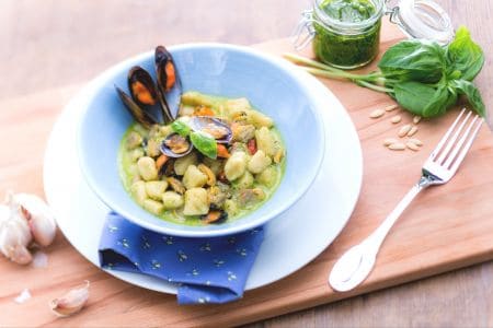 Potato gnocchi with pesto, mussels, and clams
