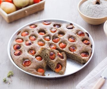 Burnt wheat focaccia with cherry tomatoes
