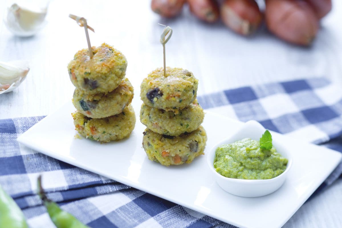 Millet balls with vegetables and broad bean cream