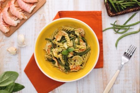 Whole wheat fusilli with green beans, shrimp tails, and basil sauce