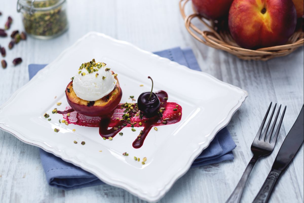 Robiola-stuffed peaches with spicy cherry sauce