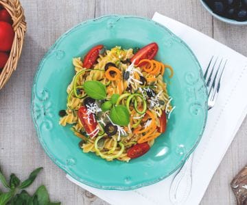 Whole wheat fusilli alla crudaiola with vegetables, pumpkin seeds and salted ricotta