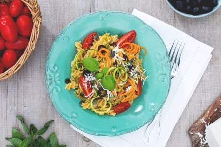 Whole wheat fusilli alla crudaiola with vegetables, pumpkin seeds and salted ricotta