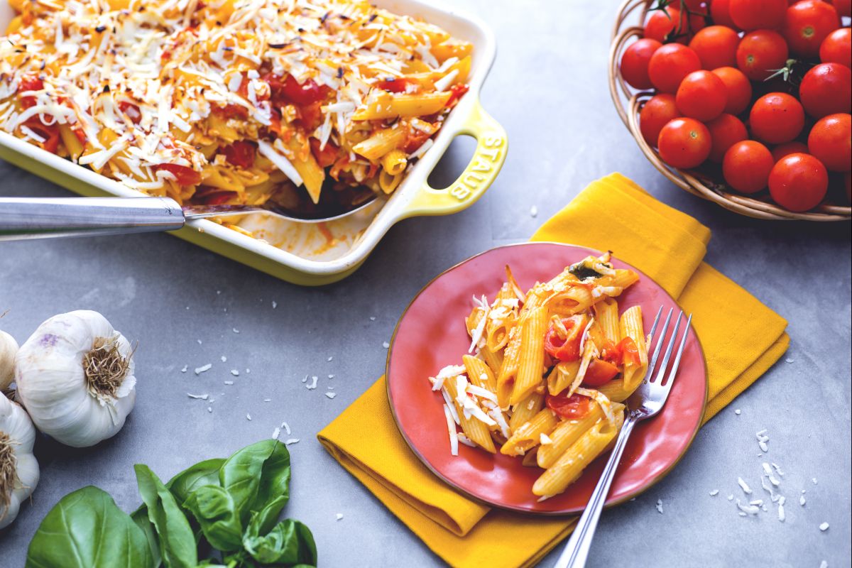 Baked penne with tomato and salted ricotta