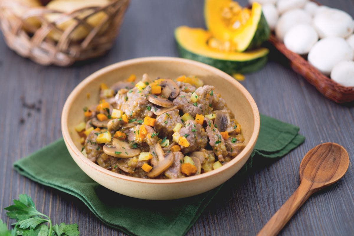 Veal stew with pumpkin, potatoes and mushrooms