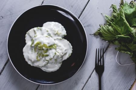 Nettle ravioli with fondue