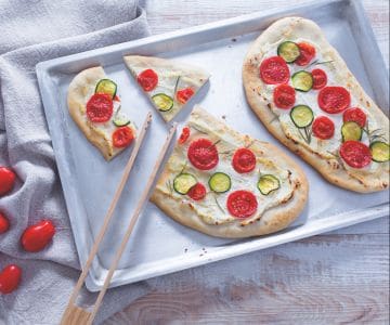 Flatbread with tomatoes and ricotta