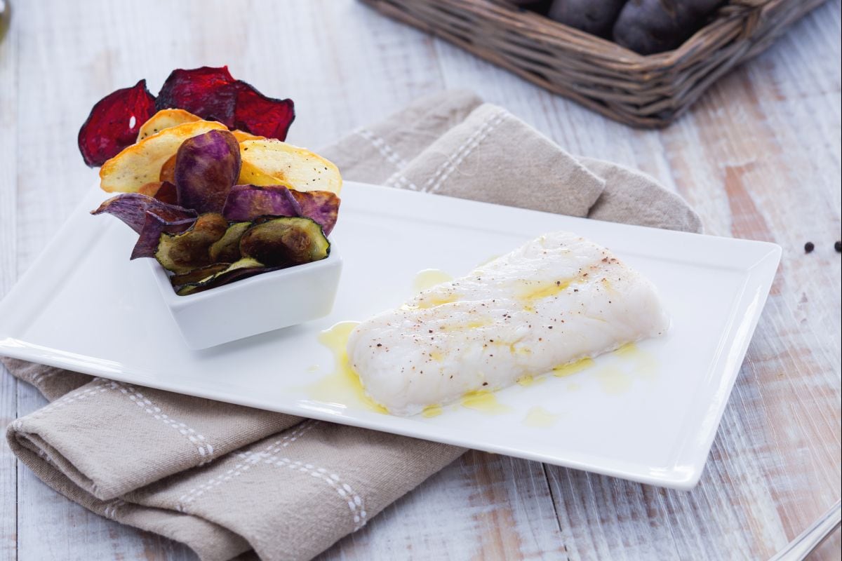 Steamed cod with turmeric and vegetable chips