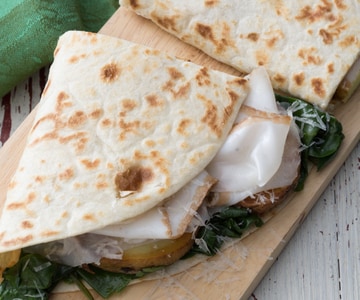 Piadina with greens, potatoes, and Colonnata lard