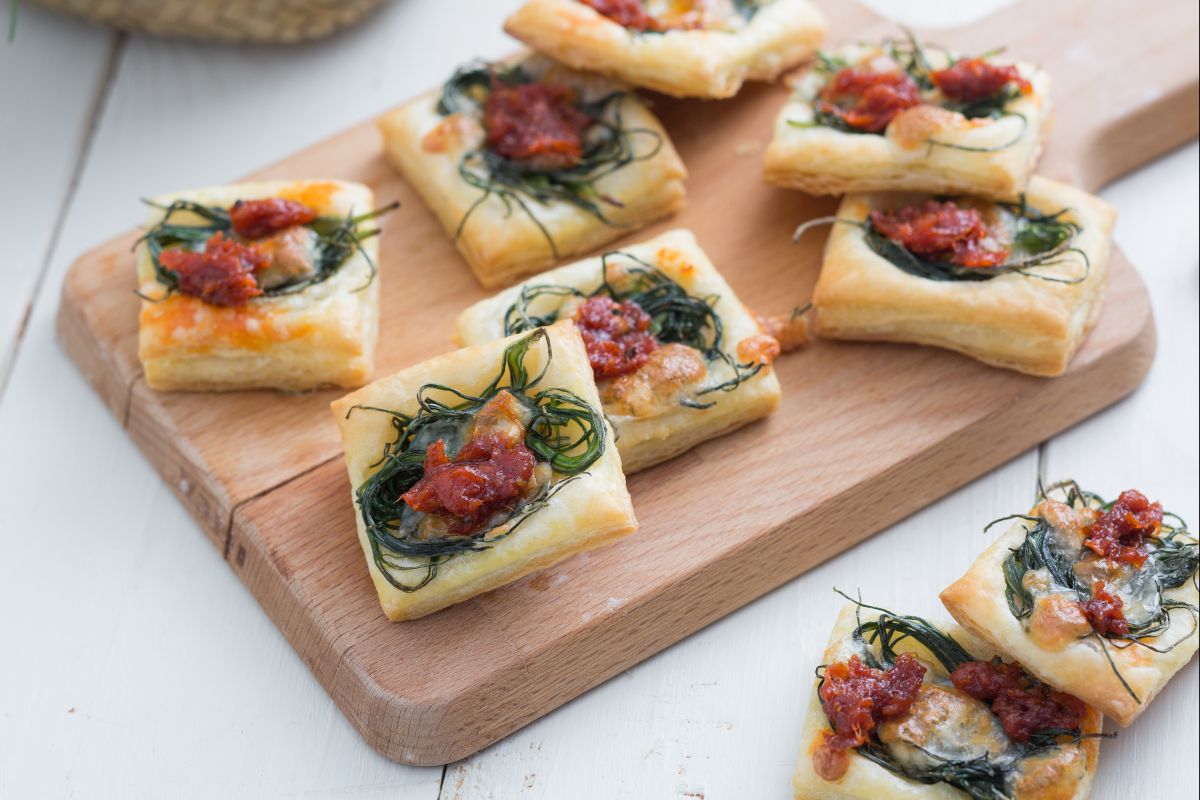 Puff pastries with agretti and nduja