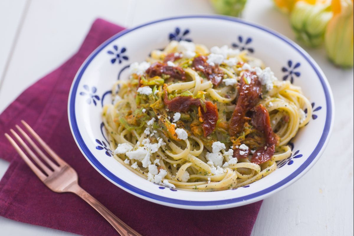 Pasta with zucchini flowers and feta