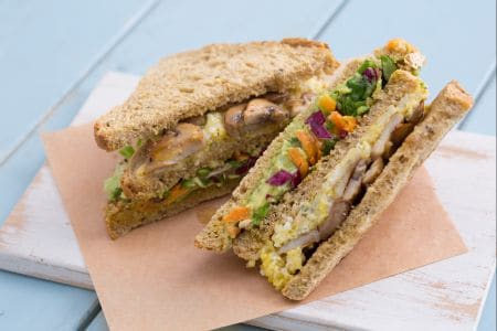 Club sandwich with scrambled eggs