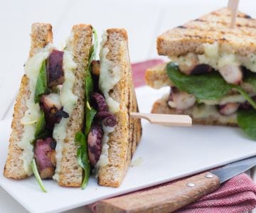 Club sandwich with octopus and potatoes