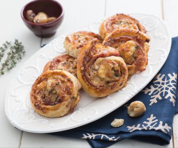 Savory puff pastry rolls with pomegranate