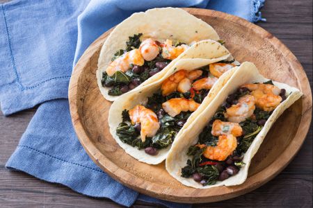 Tacos with kale and shrimp