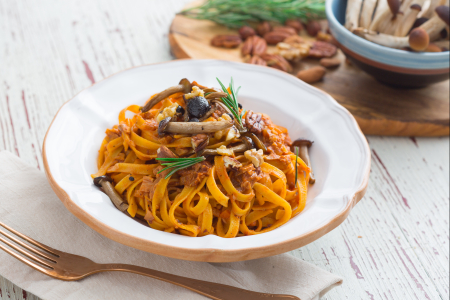 Tagliatelle with mushroom and dried fruit ragout