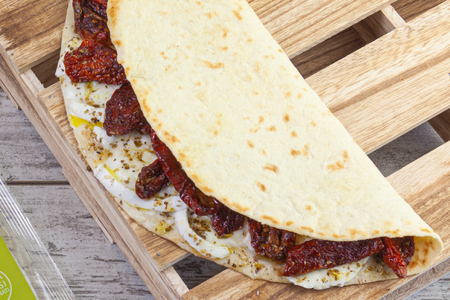 Piadina with sun-dried tomatoes and buffalo mozzarella
