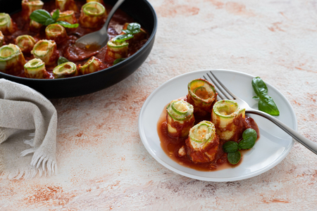 Zucchini rolls with sauce