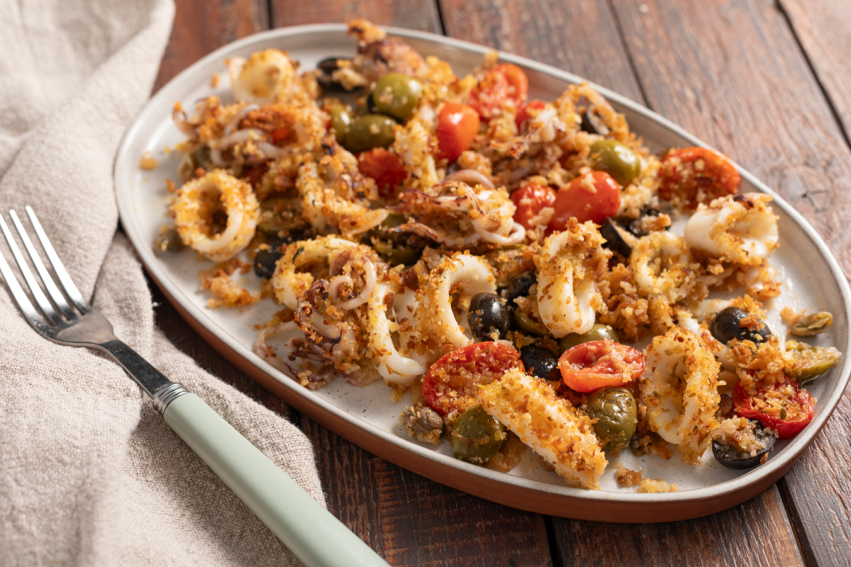Baked Gratined Squid with Cherry Tomatoes and Olives - Italian recipes