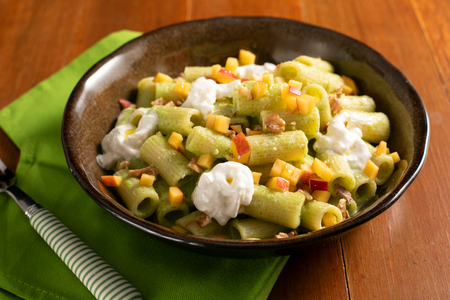 Cold pasta with zucchini cream, peaches, and stracciatella
