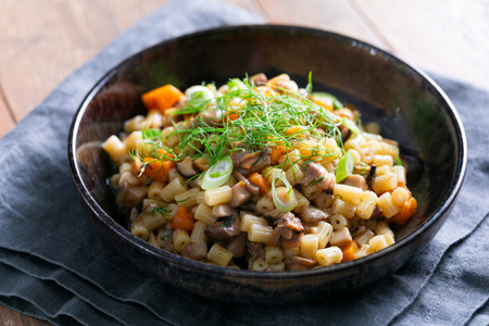 Pasta with clams, pumpkin, and mushrooms