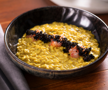Curry risotto with coconut milk and shrimp tartare