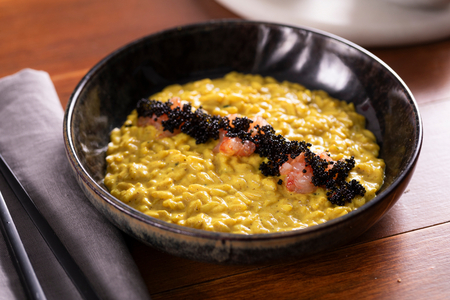 Curry risotto with coconut milk and shrimp tartare