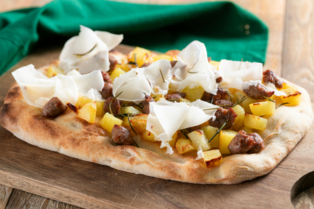 Pinsa with Sausage and Potatoes